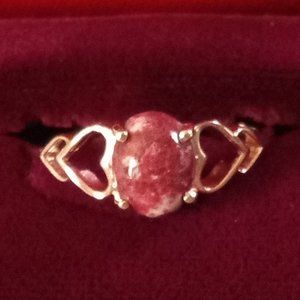 Thulite set in rose gold over sterling